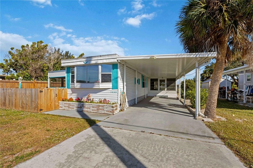 Welcome to this charming 2-bedroom, 1.5-bath residence featuring - Beach Home for sale in Englewood, Florida on Beachhouse.com