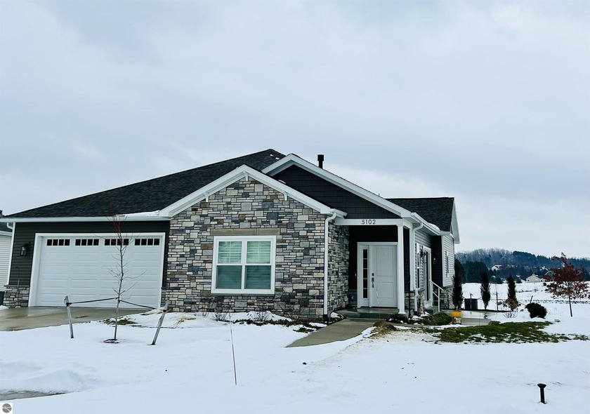 Beautifully maintained home designed for independent living with - Beach Home for sale in Traverse City, Michigan on Beachhouse.com