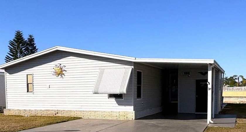 Discover your slice of paradise in this beautifully maintained - Beach Home for sale in North Fort Myers, Florida on Beachhouse.com