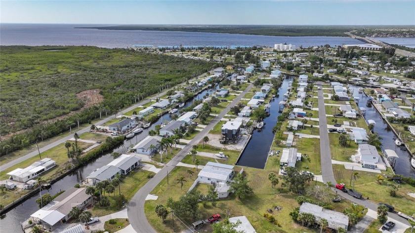 3 Lots and on Sailboat Water are great reasons to purchase this - Beach Home for sale in Port Charlotte, Florida on Beachhouse.com