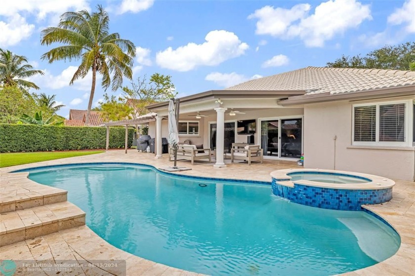 Meticulously upgraded 4 bed, 2.5 bath home nestled in the serene - Beach Home for sale in Davie, Florida on Beachhouse.com