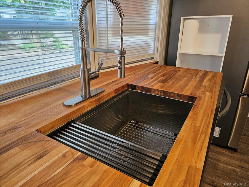 Over 55 community. Larger than it looks, with open concept - Beach Home for sale in Calverton, New York on Beachhouse.com