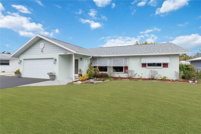 Welcome to this spacious 1,700 sq. ft. POOL HOME located just - Beach Home for sale in Englewood, Florida on Beachhouse.com
