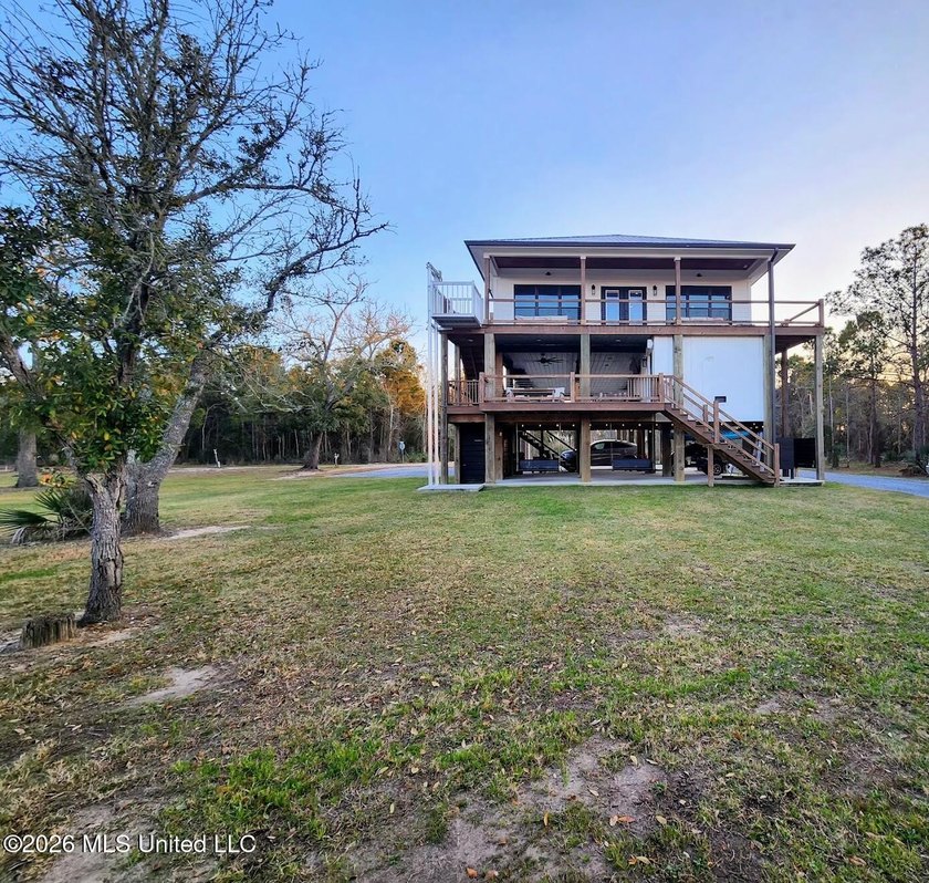 Waterfront Luxury with Private Boat Slip - Built in 2023 | Bay - Beach Home for sale in Bay Saint Louis, Mississippi on Beachhouse.com