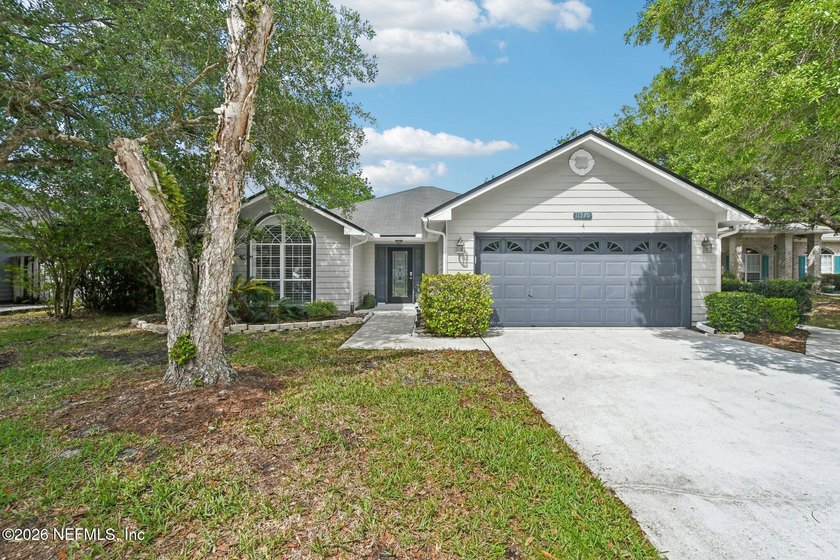 Enjoy peaceful lake views from this well-maintained 3-bedroom - Beach Home for sale in Jacksonville, Florida on Beachhouse.com
