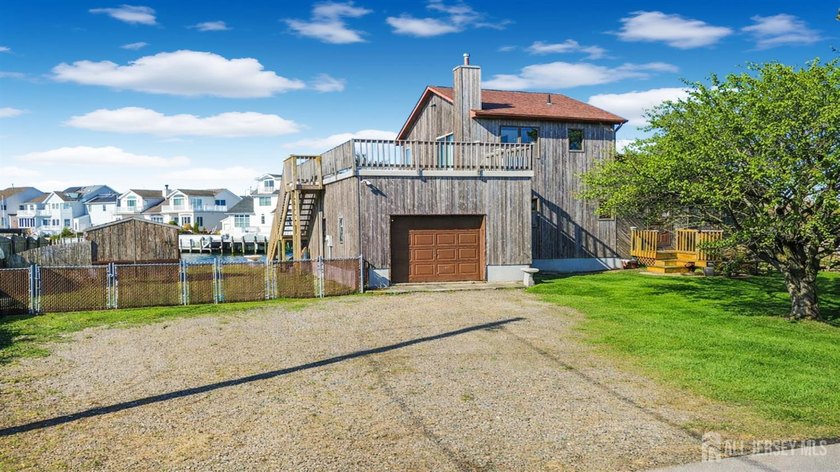 Welcome to waterfront living in Lanoka Harbor, where this - Beach Home for sale in Lacey, New Jersey on Beachhouse.com