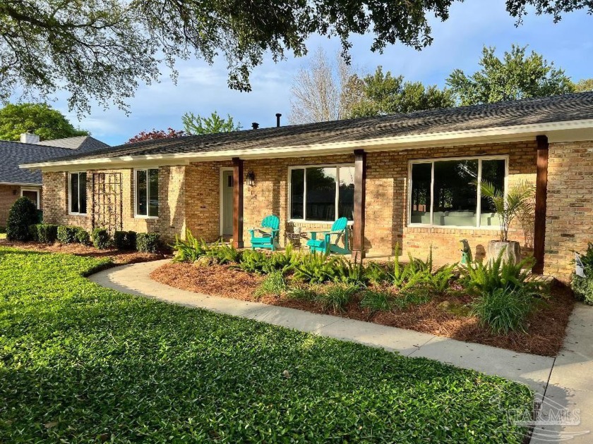This is a beautiful remodeled brick ranch nestled under a canopy - Beach Home for sale in Gulf Breeze, Florida on Beachhouse.com