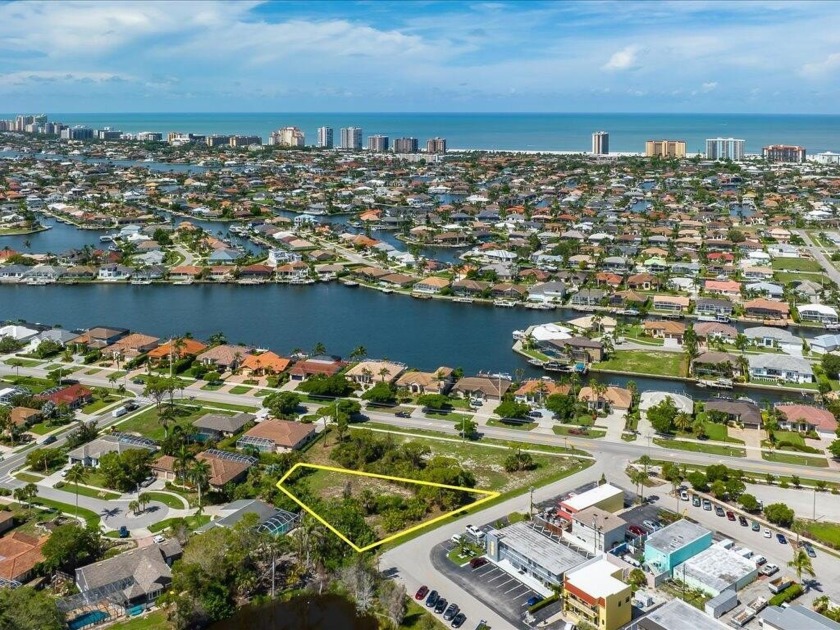 Fabulous lot off main road with potential lake view. 136 feet - Beach Lot for sale in Marco Island, Florida on Beachhouse.com