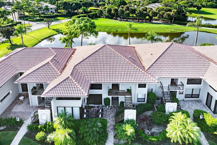 Enjoy stunning lake and golf course vistas from this - Beach Condo for sale in Boynton Beach, Florida on Beachhouse.com