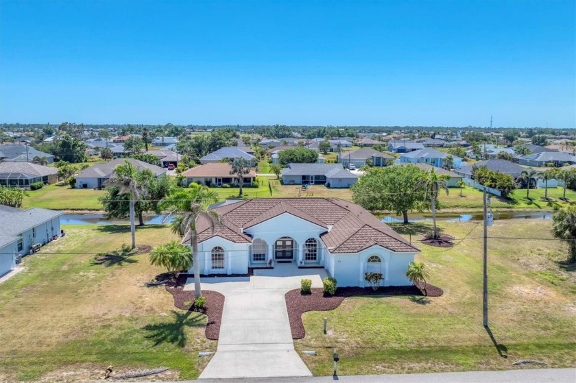 Waterfront Elegance in Rotonda West - Double Canal front Lot! - Beach Home for sale in Rotonda West, Florida on Beachhouse.com