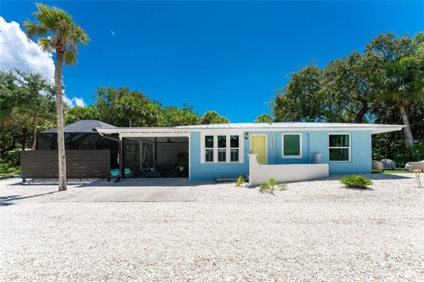 This charming Manasota Key home sits on higher elevation and - Beach Home for sale in Englewood, Florida on Beachhouse.com