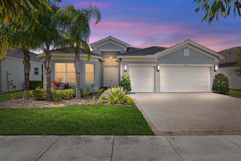 Beautiful Lakeview Pool Home in Valencia Grove! This nearly new - Beach Home for sale in Port Saint Lucie, Florida on Beachhouse.com