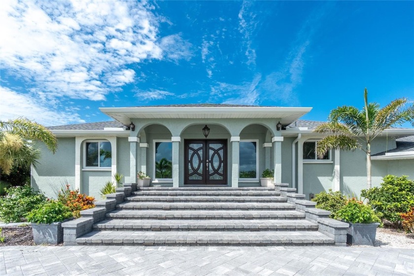 This spacious, beautifully landscaped waterfront home is a - Beach Home for sale in Placida, Florida on Beachhouse.com