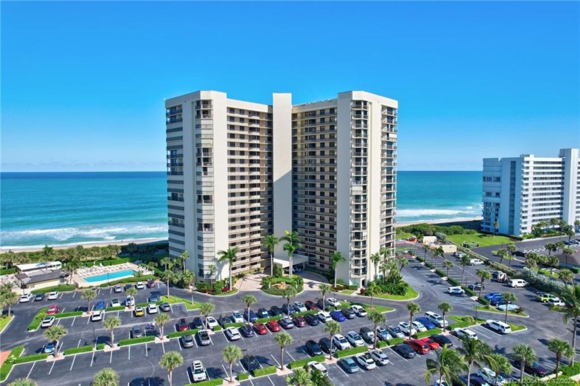 Oceanfront corner unit featuring kitchen outfitted with white - Beach Condo for sale in Jensen Beach, Florida on Beachhouse.com