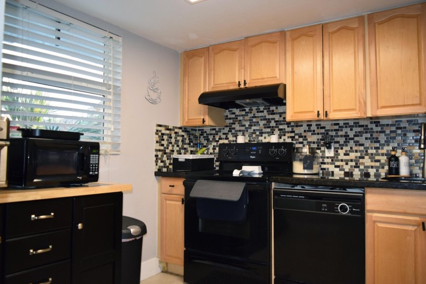 Discover this spacious 2-bedroom, 2-bathroom condo located in - Beach Condo for sale in Tamarac, Florida on Beachhouse.com