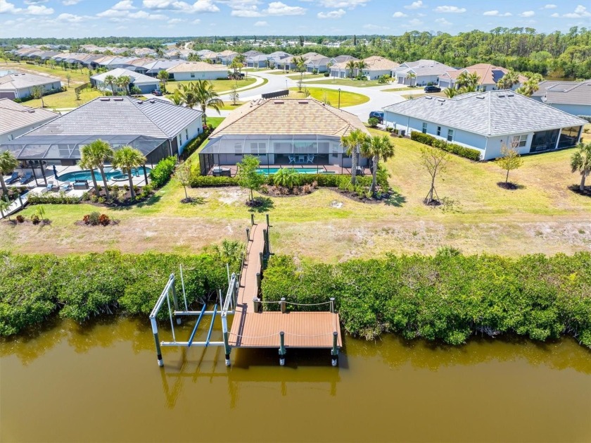 ENJOY THE FLORIDA LIFESTYLE! Newer (2021 built) pool home on - Beach Home for sale in Port Charlotte, Florida on Beachhouse.com