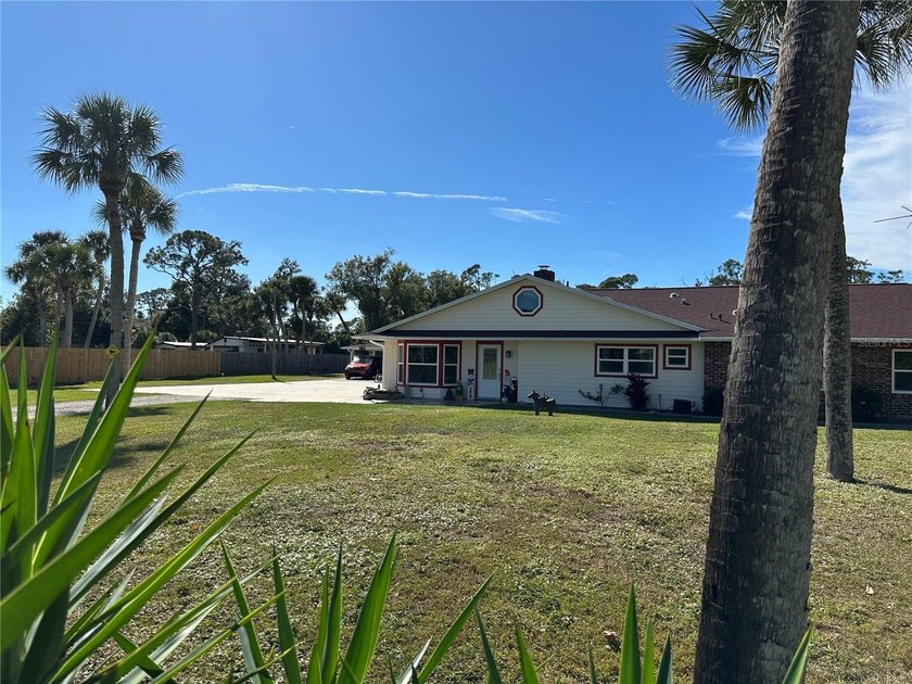 A little bit of paradise sitting on 2.3 acres. With palm trees - Beach Home for sale in Englewood, Florida on Beachhouse.com
