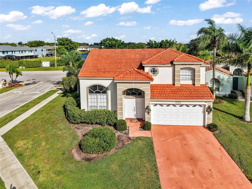 Stunning corner-lot two-story residence located in one of - Beach Home for sale in Boynton Beach, Florida on Beachhouse.com