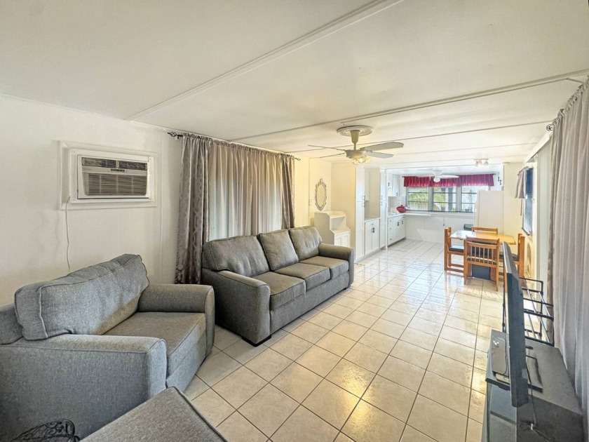 Discover this beautifully kept 2-bedroom, 1-bathroom mobile home - Beach Home for sale in Hallandale Beach, Florida on Beachhouse.com