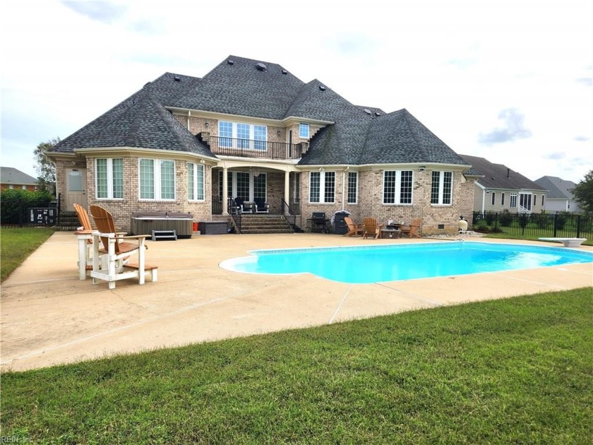 Welcome to this custom-built, all-brick home nestled in the golf - Beach Home for sale in Smithfield, Virginia on Beachhouse.com