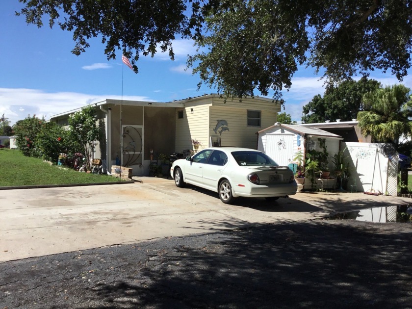 This two bedroom, one and a half bath home on a quiet street is - Beach Home for sale in Cocoa, Florida on Beachhouse.com