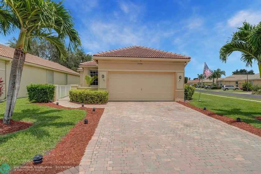 Immaculately maintained home with a NEW 2023 roof, situated on - Beach Home for sale in Delray Beach, Florida on Beachhouse.com