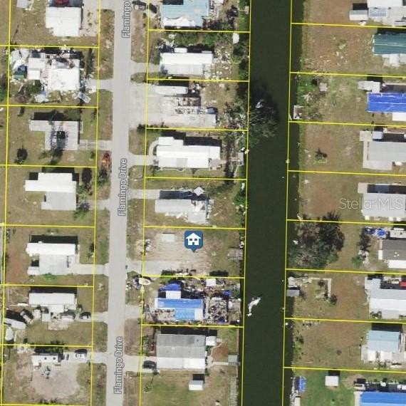 This lovely lot offers direct water access and comes complete - Beach Lot for sale in Englewood, Florida on Beachhouse.com