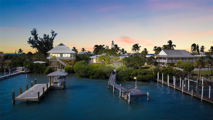 BAYFRONT HOME WITH A PRIVATE DOCK! Enjoy open views of the bay - Beach Home for sale in Placida, Florida on Beachhouse.com