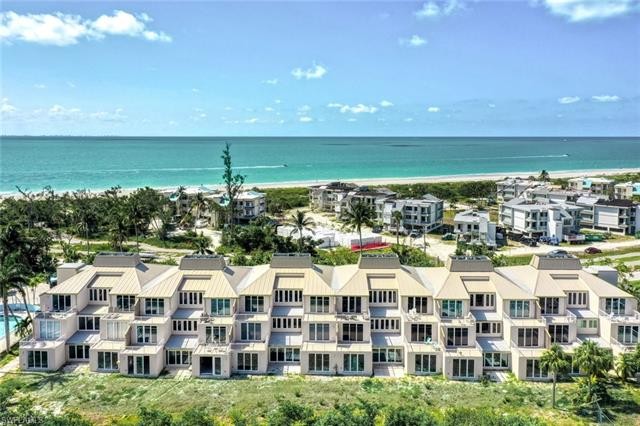 Experience the best of island living with this exquisite - Beach Condo for sale in Sanibel, Florida on Beachhouse.com