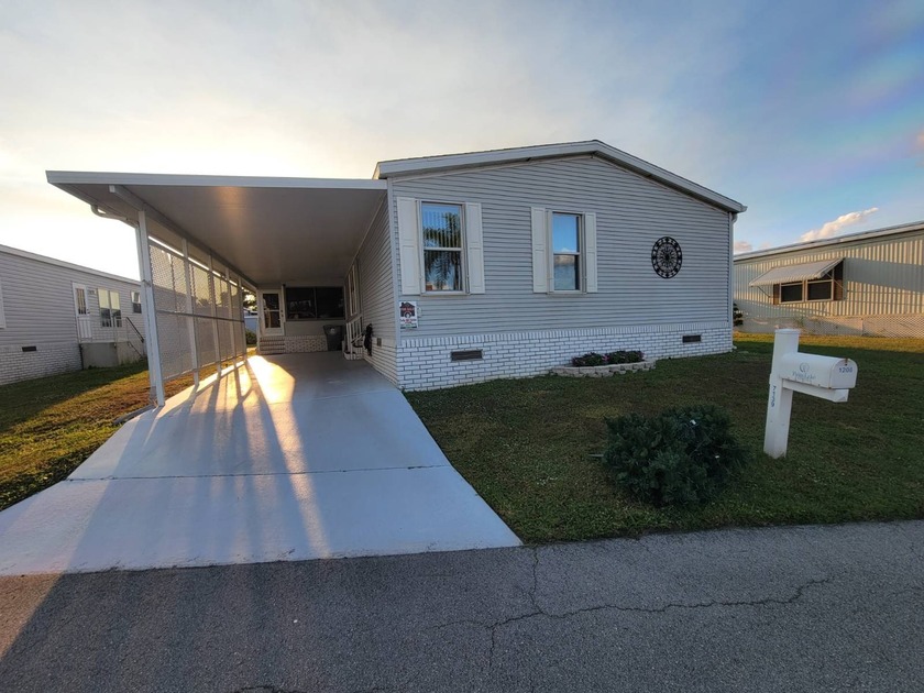 Nestled on a quiet dead-end road and just a short walk to the - Beach Home for sale in West Palm Beach, Florida on Beachhouse.com