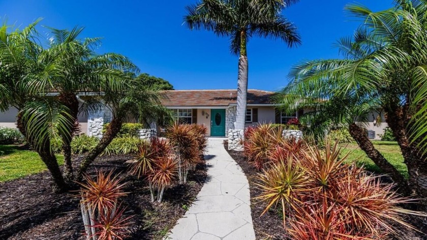 Less than a mile away from South End Beach Access, this gorgeous - Beach Home for sale in Marco Island, Florida on Beachhouse.com