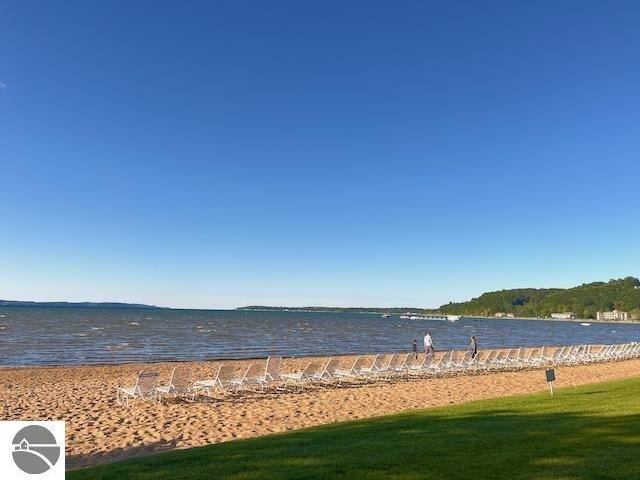 Begin your Up North adventures from this beautiful waterfront - Beach Condo for sale in Traverse City, Michigan on Beachhouse.com