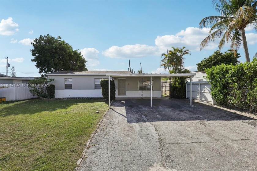 Welcome to this well-maintained 3-bedroom, 1-bath home located - Beach Home for sale in Lake Worth, Florida on Beachhouse.com