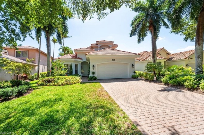 With commanding views of Kensington's prized golf course, this - Beach Home for sale in Naples, Florida on Beachhouse.com