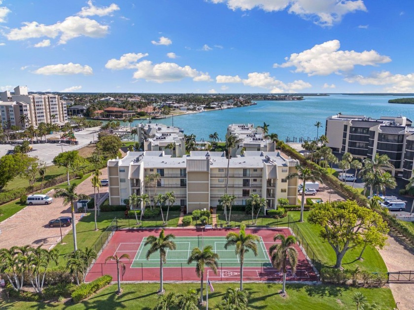 Nestled in the coveted Waters Edge community, this charming - Beach Condo for sale in Marco Island, Florida on Beachhouse.com