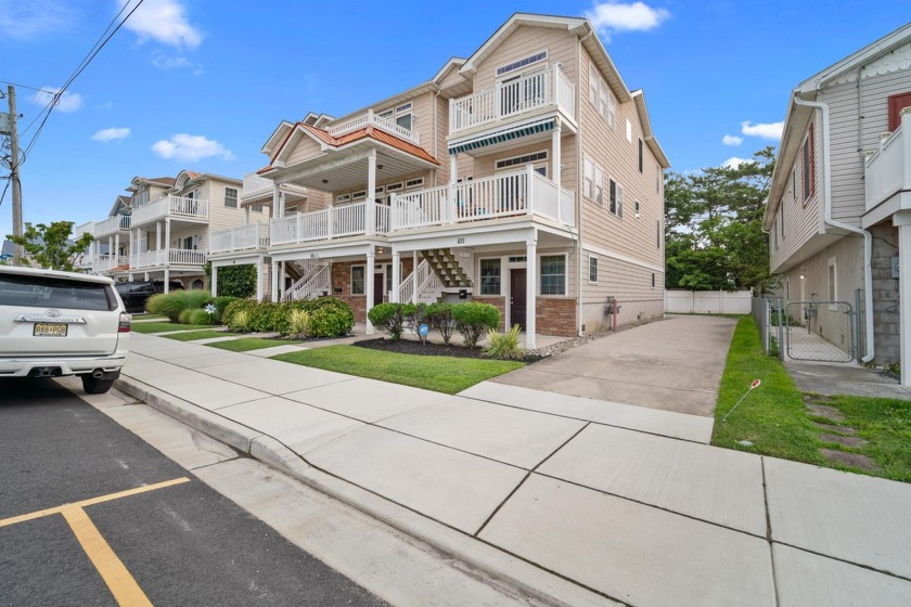 Welcome to 411 West Taylor Avenue! This lovely four-bedroom - Beach Townhome/Townhouse for sale in Wildwood, New Jersey on Beachhouse.com