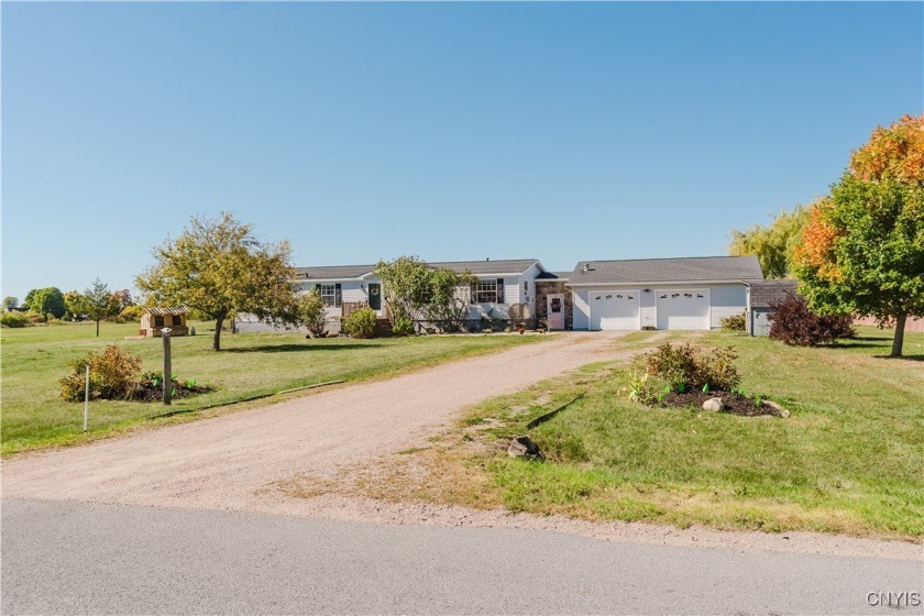 Welcome to this beautiful Clayton countryside home set on 0.88 - Beach Home for sale in Clayton, New York on Beachhouse.com