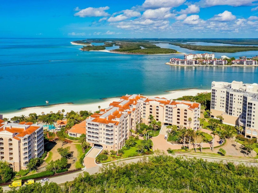 Discover luxury living in this beautifully remodeled 2-bedroom + - Beach Condo for sale in Marco Island, Florida on Beachhouse.com