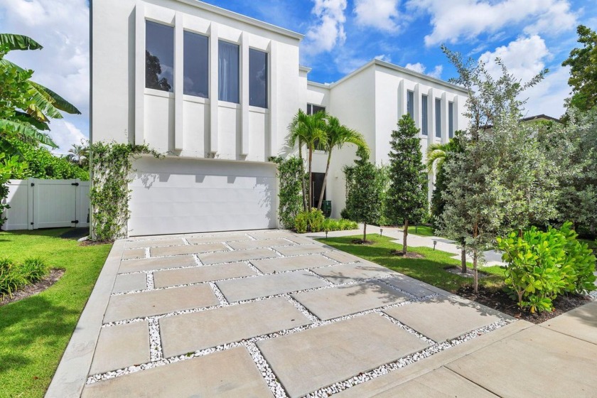 A meticulous new construction home offering four bedrooms and - Beach Home for sale in West Palm Beach, Florida on Beachhouse.com