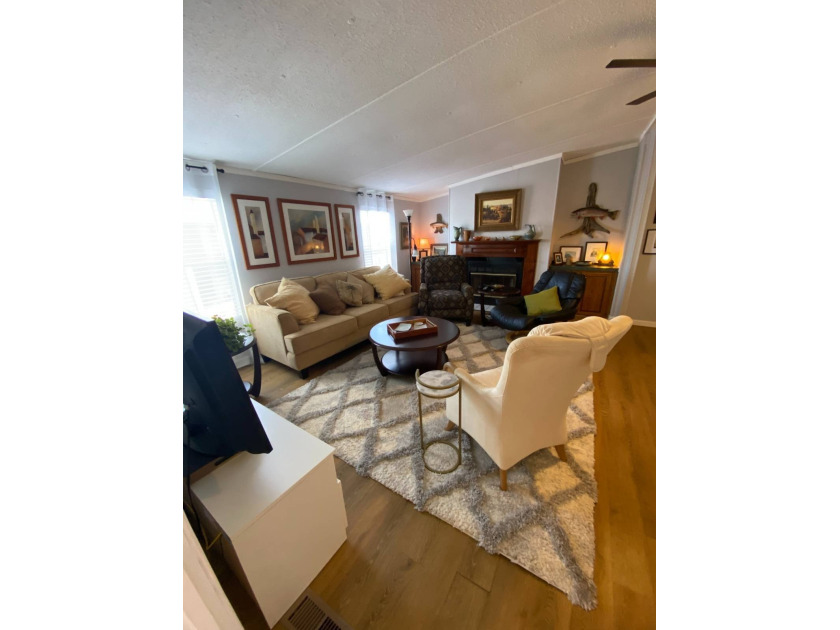 This updated open-concept 3-bedroom, 2 full bathrooms with a - Beach Home for sale in Ruskin, Florida on Beachhouse.com