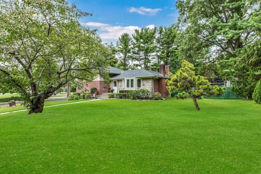 Charming Glen Cove Home with Modern Upgrades and Ample Amenities - Beach Home for sale in Glen Cove, New York on Beachhouse.com