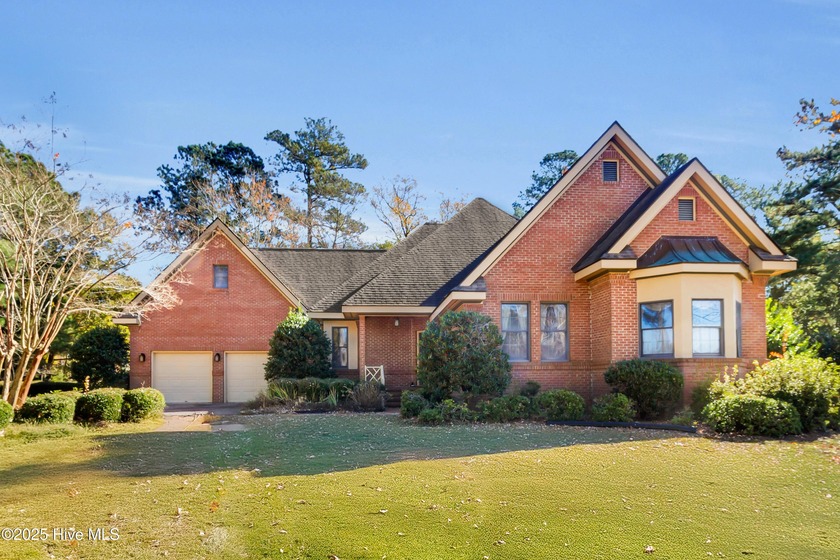 Discover timeless elegance in this custom brick home nestled in - Beach Home for sale in New Bern, North Carolina on Beachhouse.com