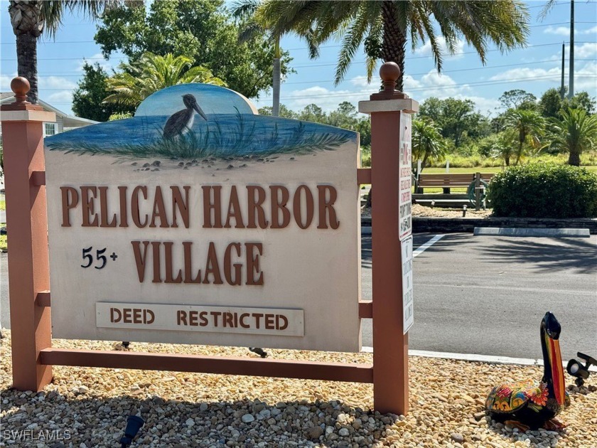 Waterfront Paradise Awaits in Pelican Harbor! Your Dream 55+ - Beach Home for sale in Punta Gorda, Florida on Beachhouse.com