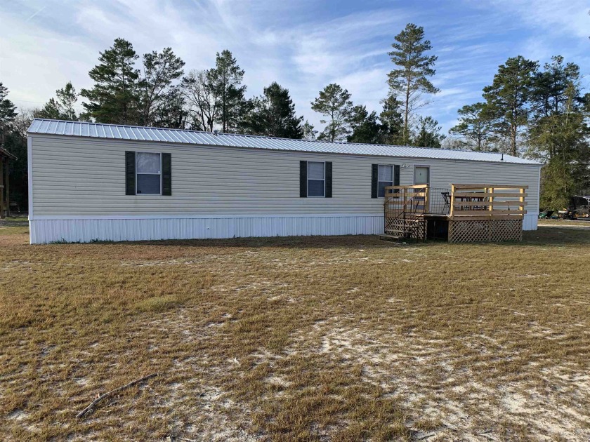 Wow conveniently located adorable manufactured home on almost an - Beach Home for sale in Perry, Florida on Beachhouse.com