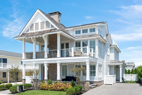 Discover the epitome of coastal elegance at 106 120th St - Beach Home for sale in Stone Harbor, New Jersey on Beachhouse.com