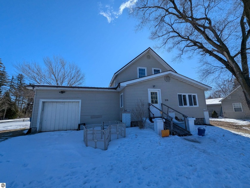 Spacious home on a large corner lot in the City of Au Gres. This - Beach Home for sale in Au Gres, Michigan on Beachhouse.com
