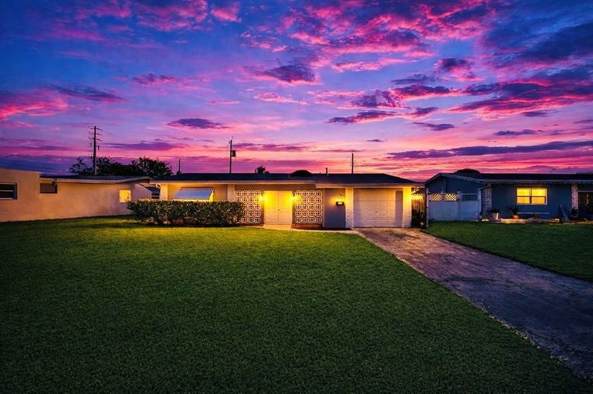 Designed for effortless entertaining, this beautifully updated - Beach Home for sale in Miramar, Florida on Beachhouse.com