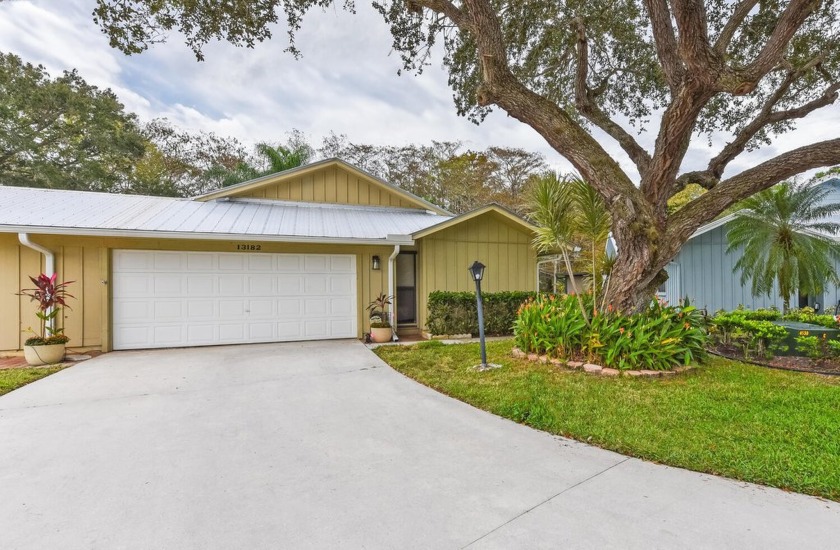 Situated at the end of a quiet cul-du-sac in the sought after - Beach Home for sale in Hobe Sound, Florida on Beachhouse.com