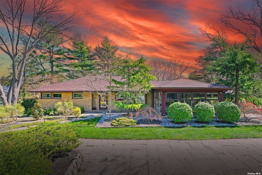 Discover the harmony of this Frank Lloyd Wright inspired - Beach Home for sale in Huntington, New York on Beachhouse.com