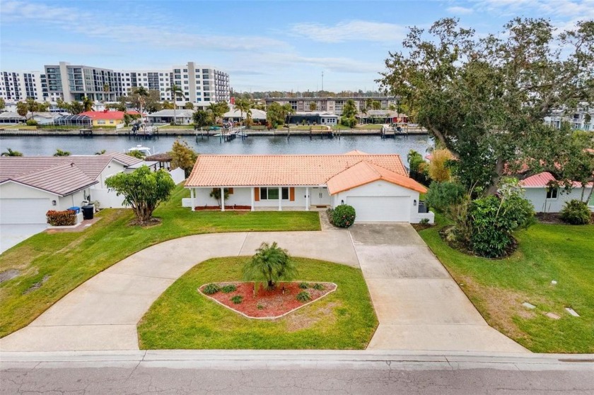 Come see the promise of waterfront living in this classic split - Beach Home for sale in St. Petersburg, Florida on Beachhouse.com